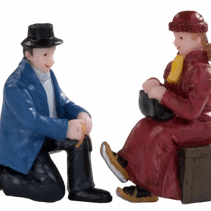 DV111229 - Dickensville Man bindt schaatsen onder